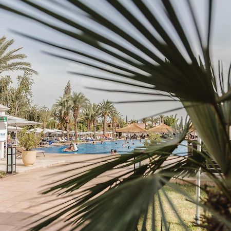 Kenzi Menara Palace & Resort Марракеш Экстерьер фото A swimming pool in a hotel in Tunisia