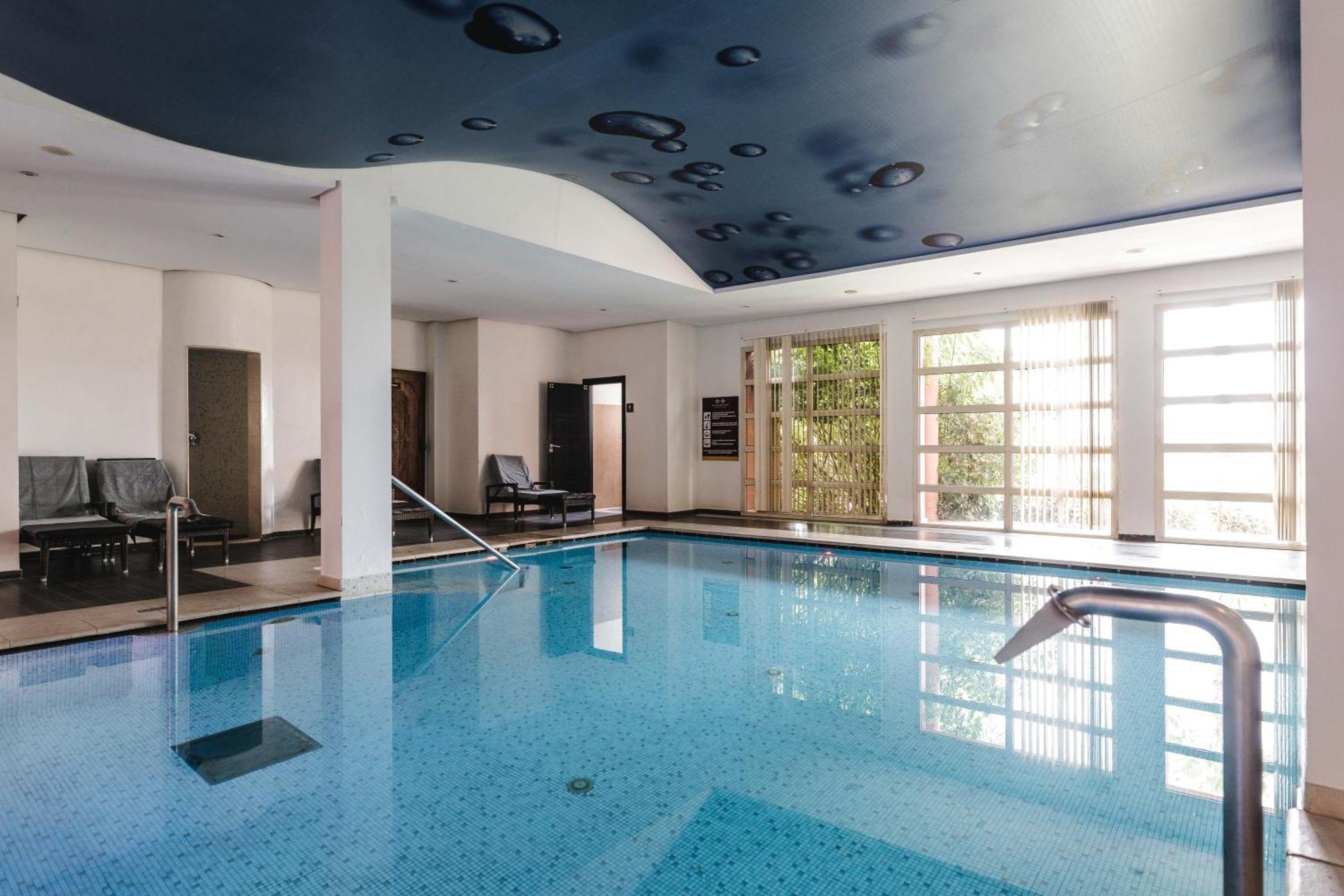 Kenzi Menara Palace & Resort Марракеш Экстерьер фото The swimming pool at the hotel