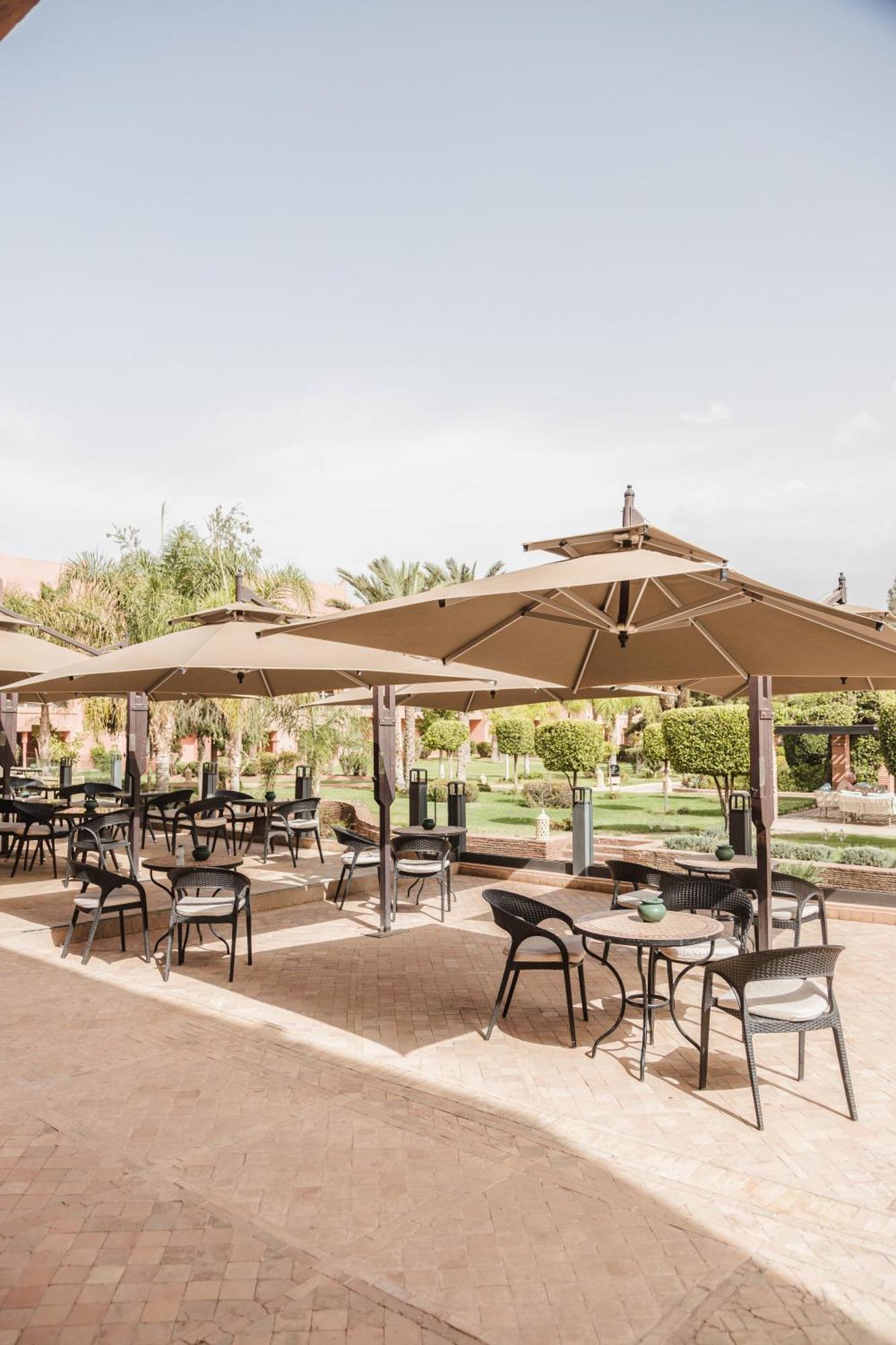 Kenzi Menara Palace & Resort Марракеш Экстерьер фото The patio at the Saguaro
