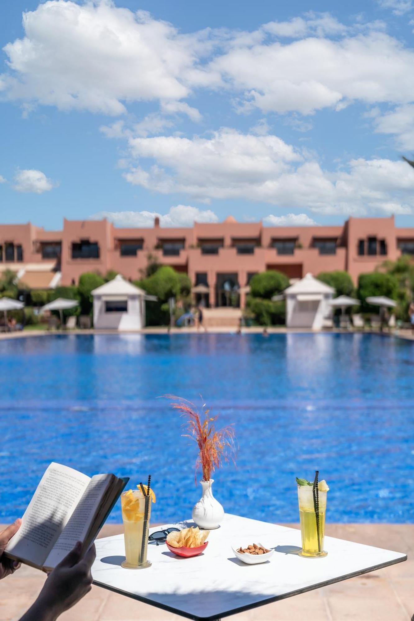 Kenzi Menara Palace & Resort Марракеш Экстерьер фото The swimming pool at the hotel