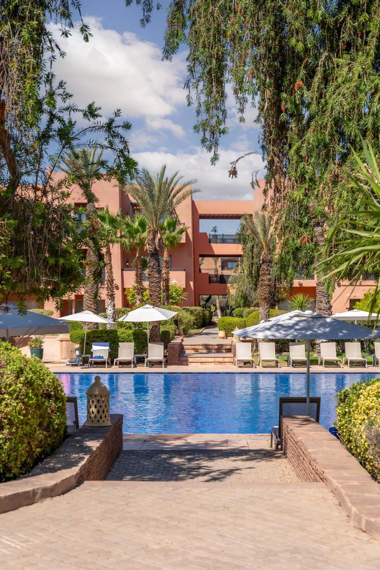 Kenzi Menara Palace & Resort Марракеш Экстерьер фото The swimming pool at the hotel