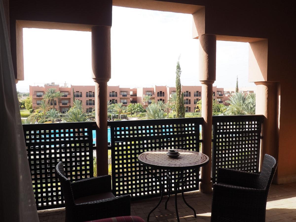 Kenzi Menara Palace & Resort Марракеш Экстерьер фото A balcony at the hotel