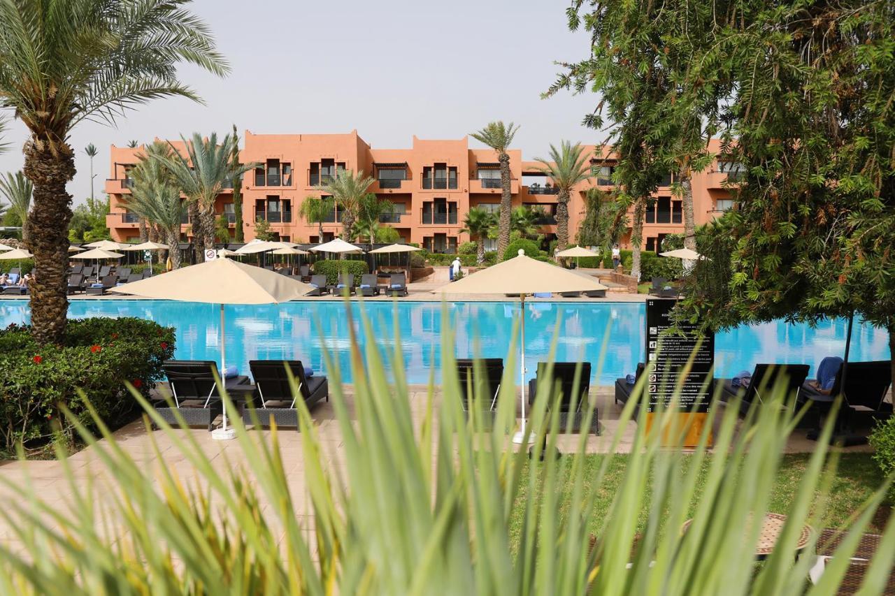 Kenzi Menara Palace & Resort Марракеш Экстерьер фото The swimming pool at the hotel